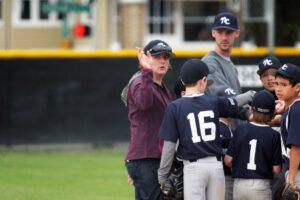 Julie McCleery coaching a youth baseball team